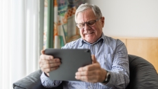 Person looking at a tablet