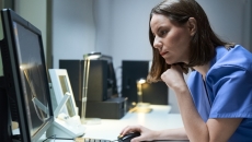 Healthcare professional reviewing data Healthcare professional reviewing data