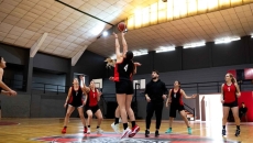 Women playing basketball Women playing basketball