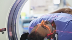 Person undergoing MRI scan Person undergoing MRI scan