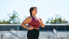 A woman working out wearing a Fitbit Inspire 2 A woman working out wearing a Fitbit Inspire 2