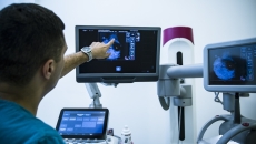 Technician looking at x-ray