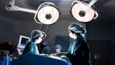 Surgeons in an operating room Surgeons in an operating room
