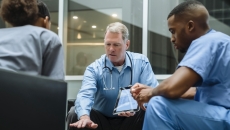 Physicians reviewing data