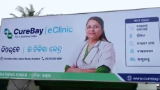 A signboard of a CureBay e-clinic in rural India
