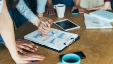 A group of people at a business meeting A group of people at a business meeting