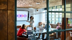 A person presenting to a group of investors.