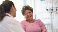 Older woman speaking with the doctor about her concerns Older woman speaking with the doctor about her concerns