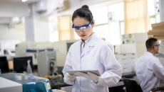 A scientist working in a lab A scientist working in a lab