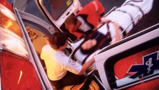 Overhead picture of emergency medical services loading a patient into an ambulance