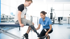 Physical therapist working with a patient